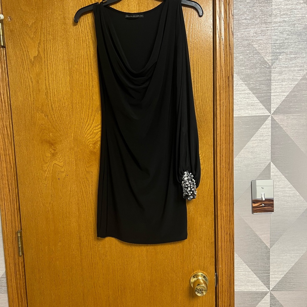 Sheer one sleeve top with small stones on sleeve